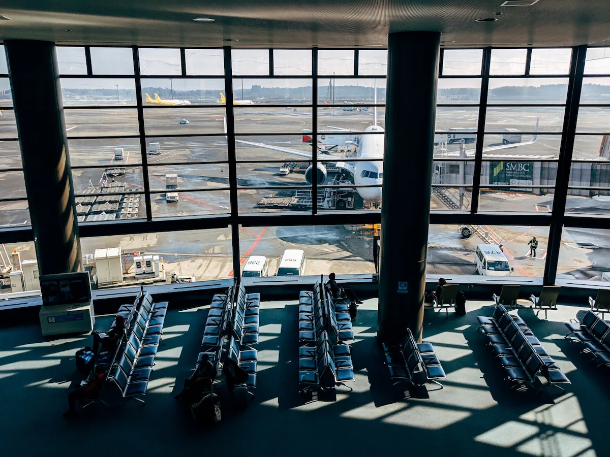 People resting at the airport terminal