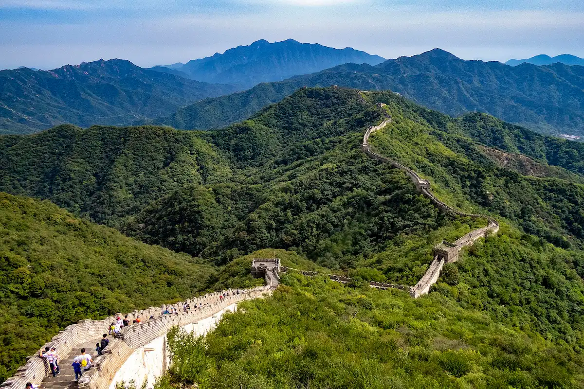 Great Wall of China winding along mountain ridges at the Mutianyu section near Beijing