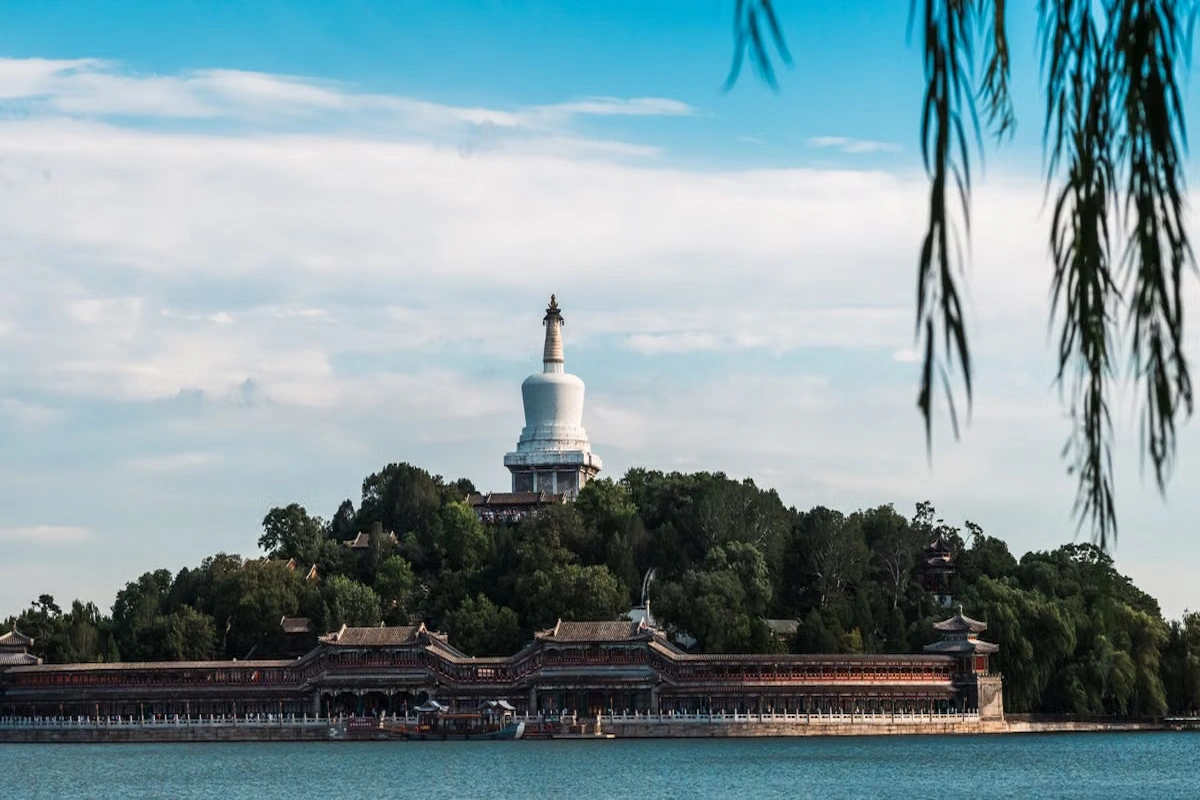 White Dagoba on Jade Flower Island above the lake in Beihai Park, Beijing