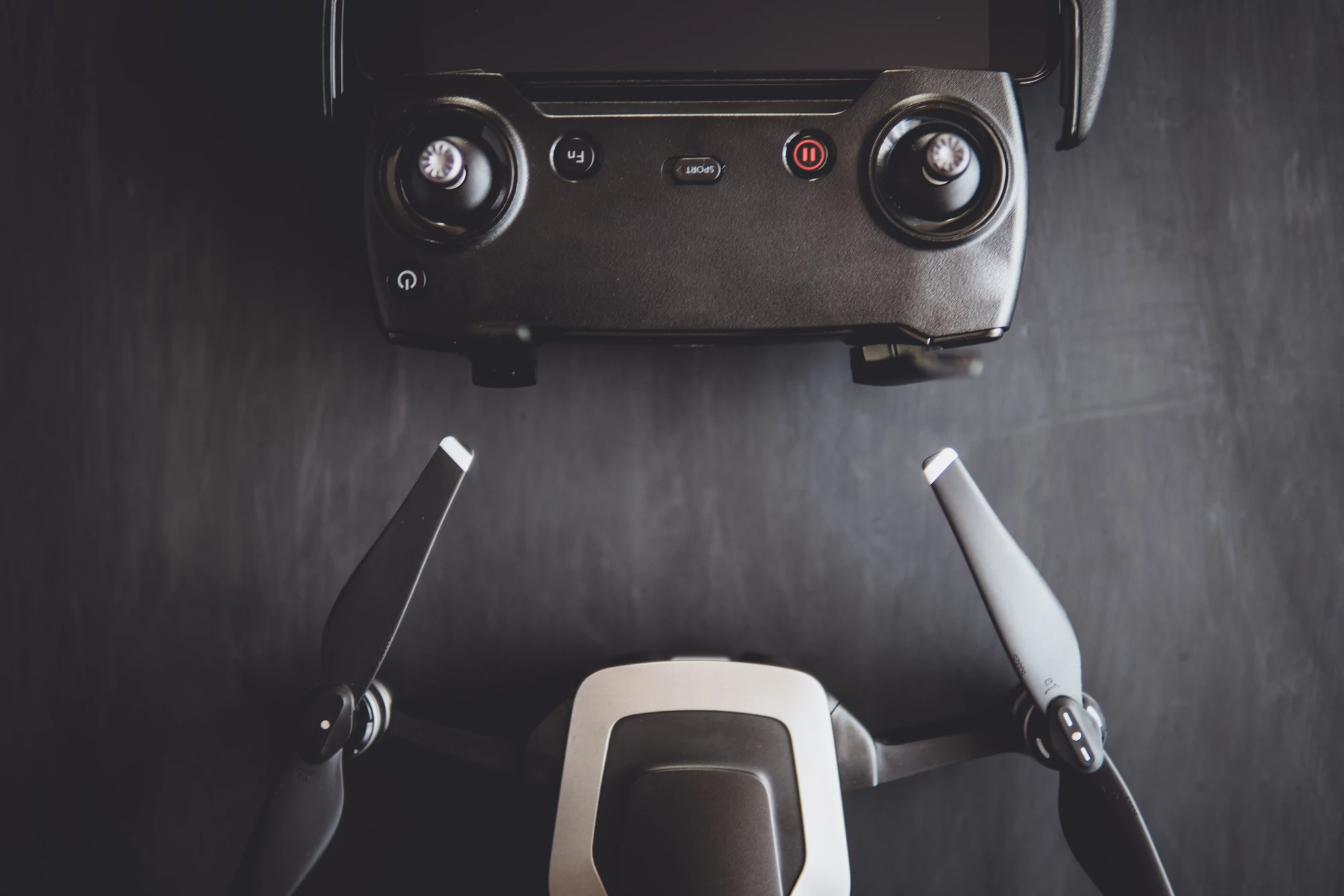 Drone and controller left at an airport charging station