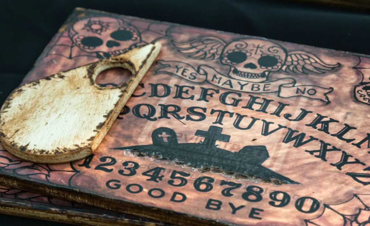 Wooden Ouija board found in an airport lost and found bin