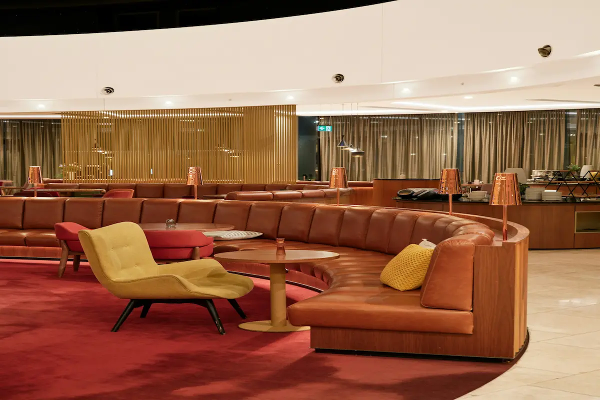 Comfortable seating area inside an airport lounge