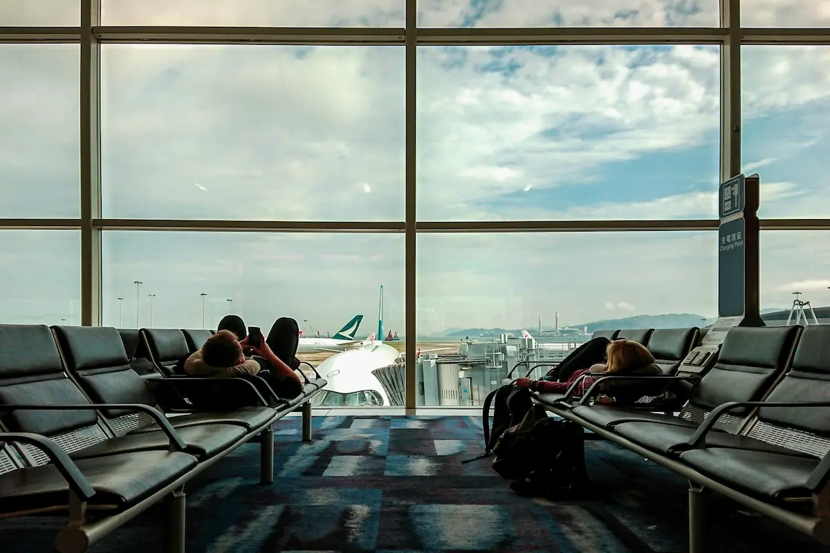 Seating area inside an airport terminal at night
