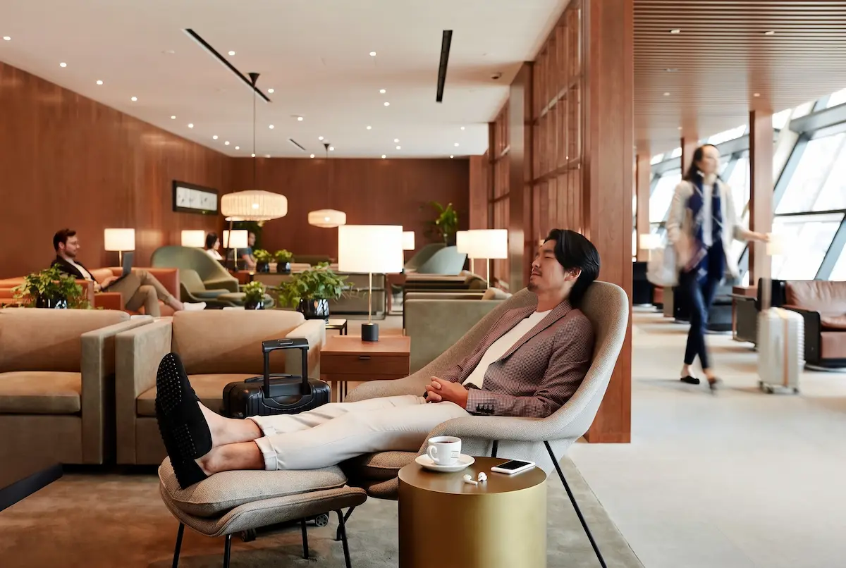 Traveller relaxing in an airport lounge during a long layover