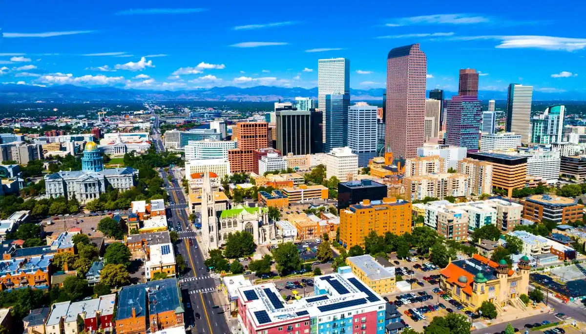 Denver City Bus Tour with mountain backdrop