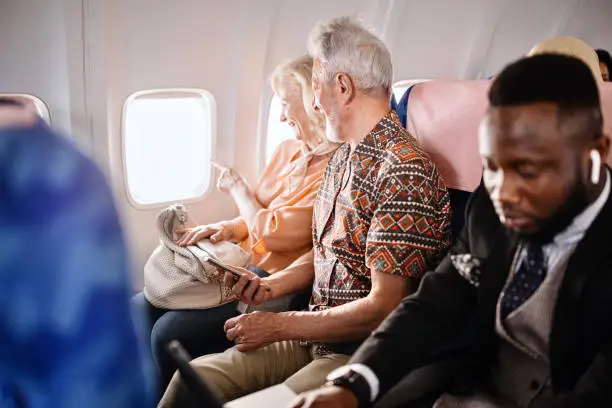 elderly passengers on plane