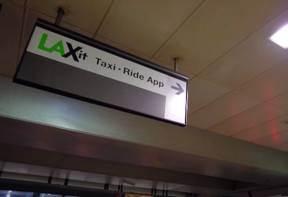 lax laxit transfer sign at airport