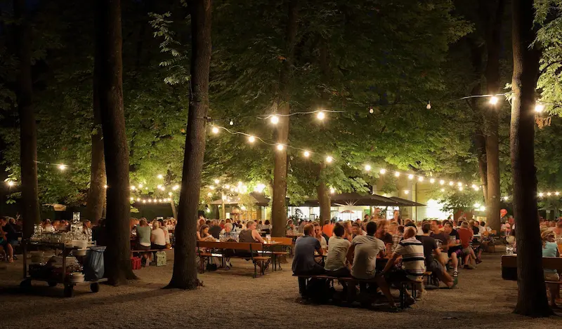 People gathering in a traditional Munich beer garden