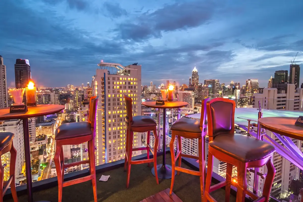 Rooftop bar overlooking the Sydney skyline at night