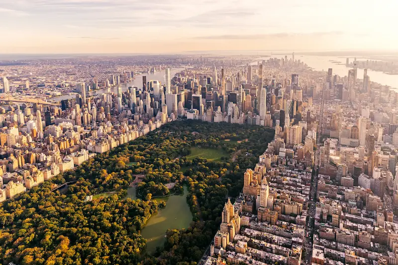 Aerial view of Central Park surrounded by Manhattan skyscrapers