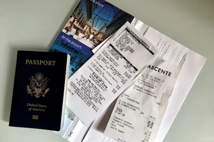 Tax Refund receipts and forms with passport